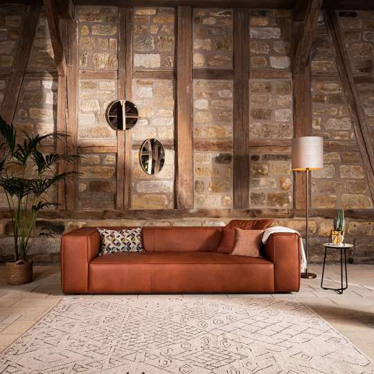 W. Schillig - 18050 around-the-block - Ledersofa Cognac im Wohnraum