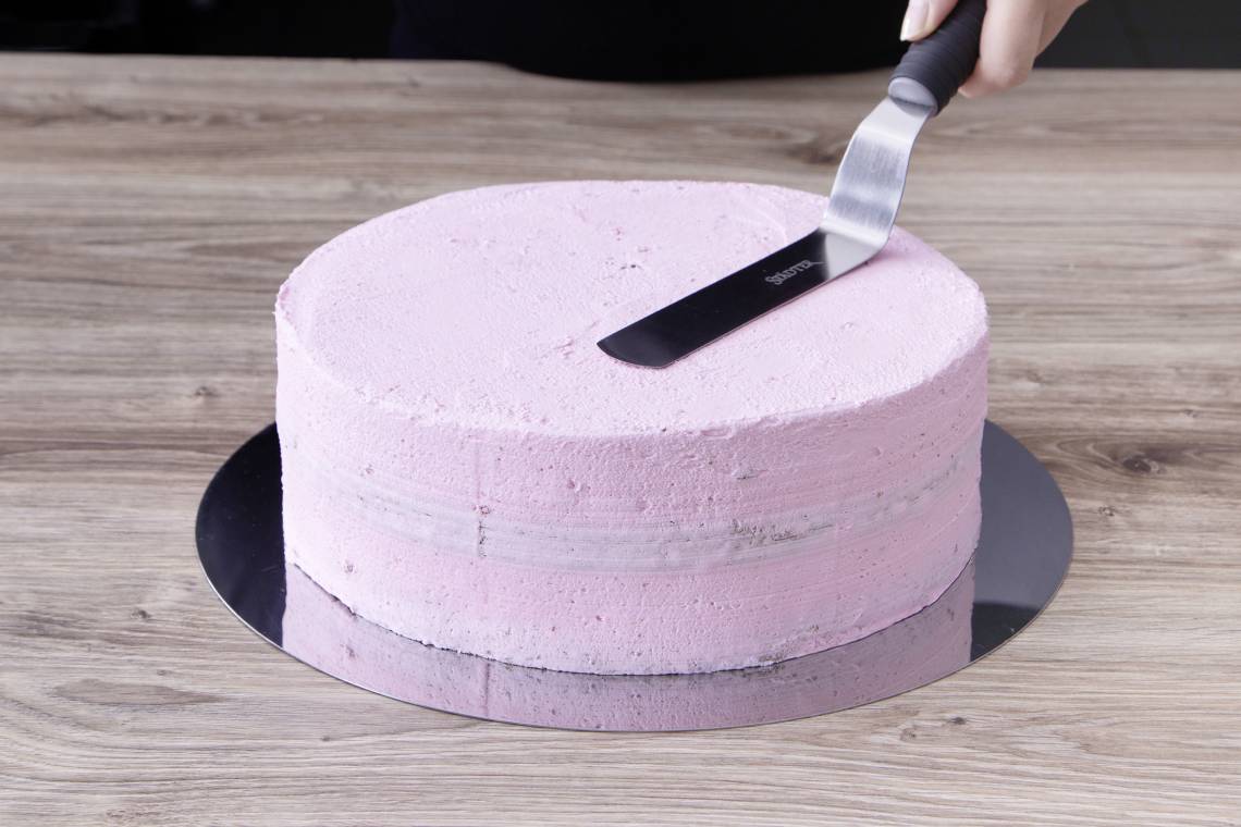 Städter: Tortenunterlage rund mit rosa Creme